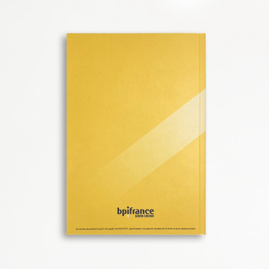 Carnet jaune Bpifrance - Vue de dos, cartonnée souple, dos carré collé - Big Boutique Bpifrance.